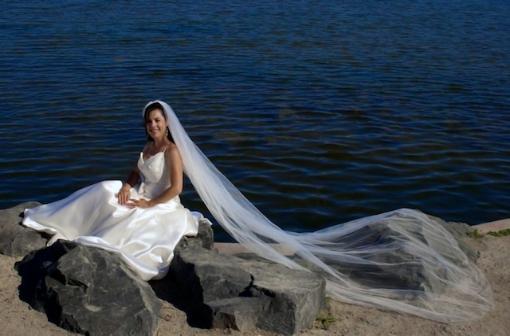 Beautiful bride on the waters edge